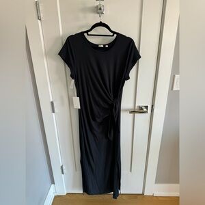 BNWT Black wrap dress from Aritzia.